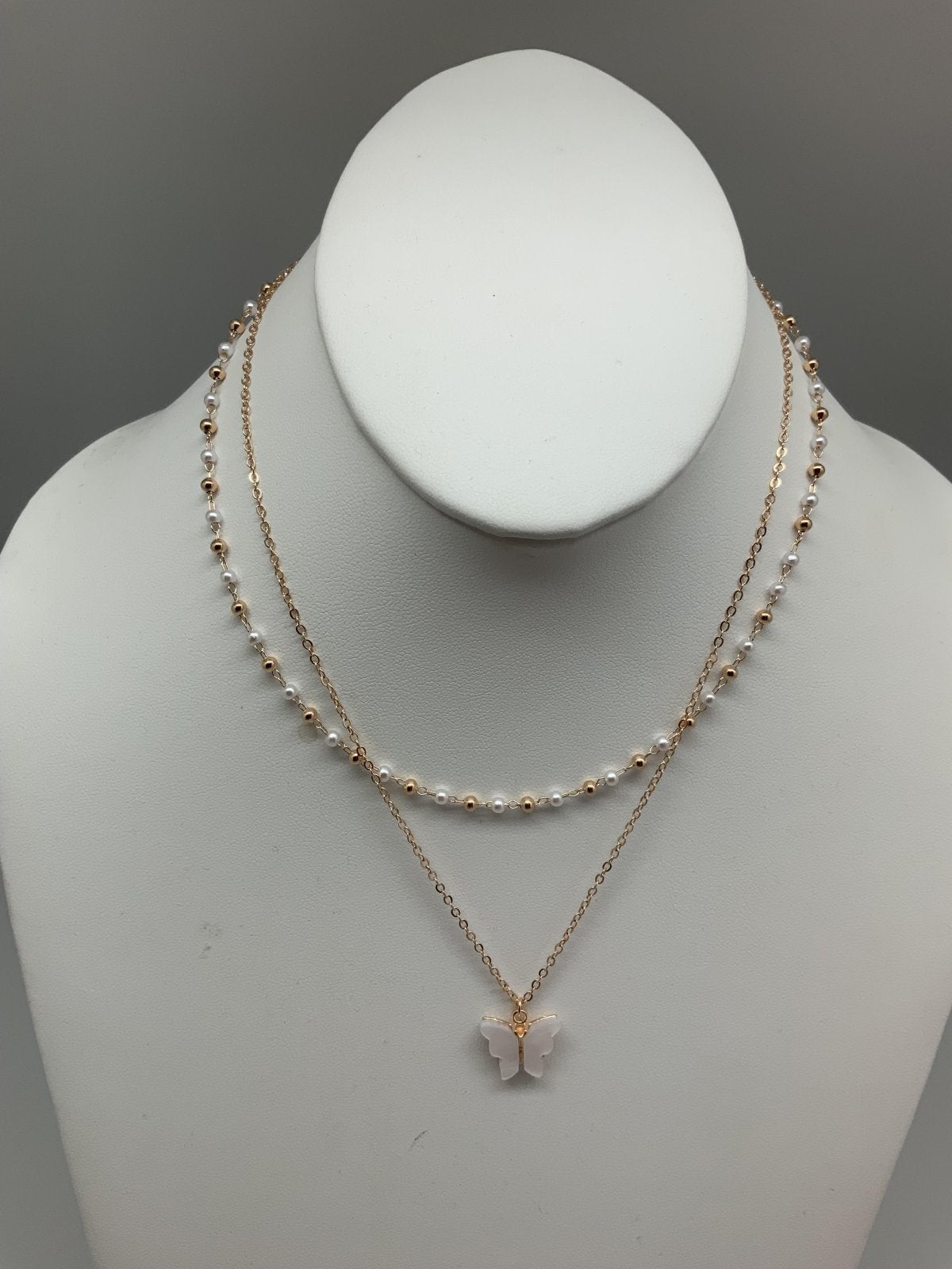 010-butterfly necklace neutral