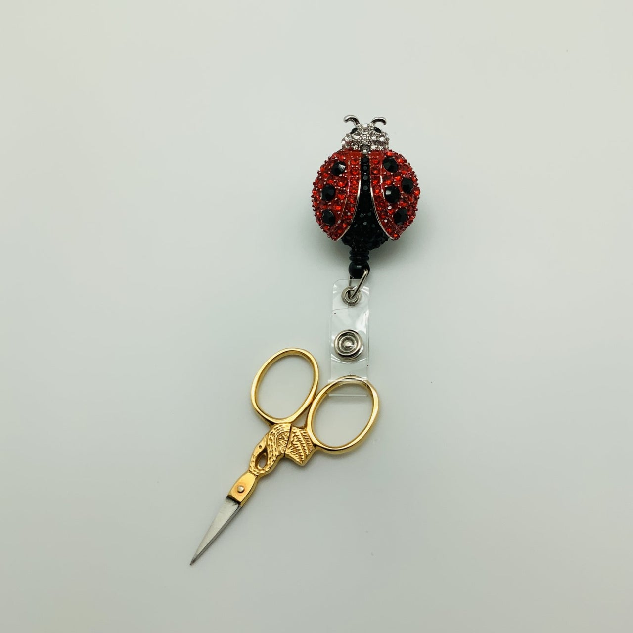 Bling clip and reel ladybug