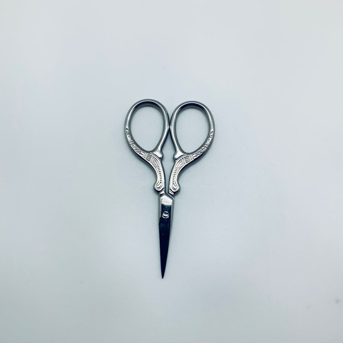 Silver embroidery scissors