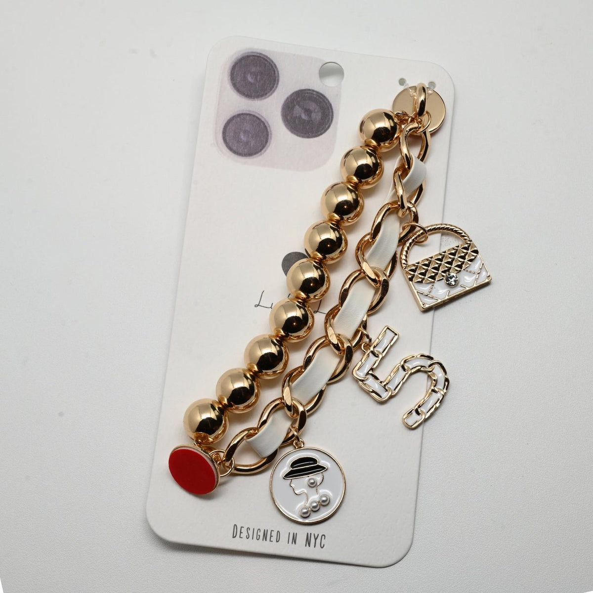 011-Charmed Phone Strap Gold