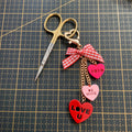 Scissor charm-hearts